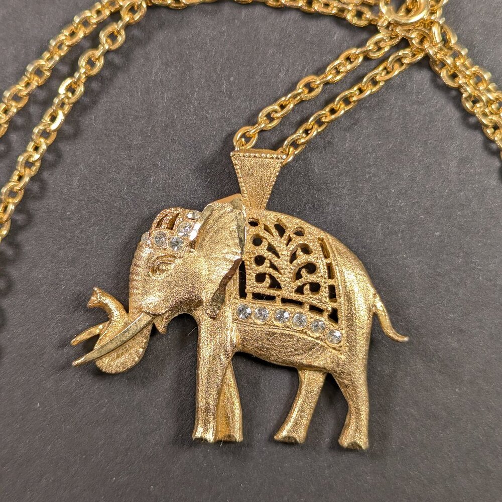 Gold toned Thai Elephant Pendant on 24.5" chain, diamond cut elephant charm